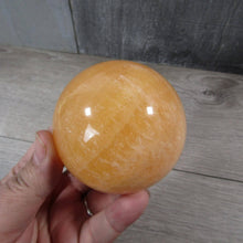 Load image into Gallery viewer, Large Orange Calcite Sphere