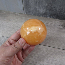 Load image into Gallery viewer, Large Orange Calcite Sphere