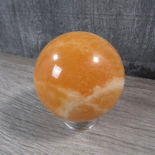 Load image into Gallery viewer, Large Orange Calcite Sphere