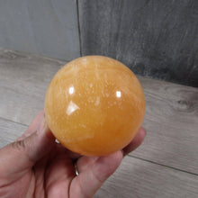 Load image into Gallery viewer, Large Orange Calcite Sphere