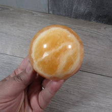 Load image into Gallery viewer, Large Orange Calcite Sphere