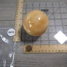 Load image into Gallery viewer, Large Orange Calcite Sphere
