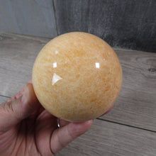 Load image into Gallery viewer, Large Orange Calcite Sphere
