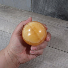 Load image into Gallery viewer, Large Orange Calcite Sphere
