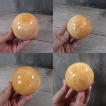 Load image into Gallery viewer, Large Orange Calcite Sphere
