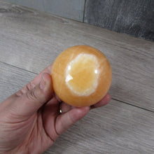 Load image into Gallery viewer, Large Orange Calcite Sphere
